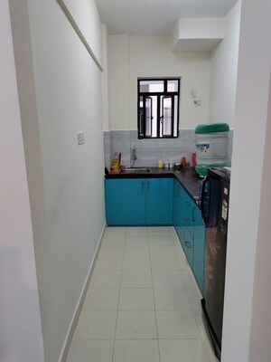 Kitchen in 2 BHK Apartment at Shrachi Greenwood Nest, Rajarhat New Town – for Rent