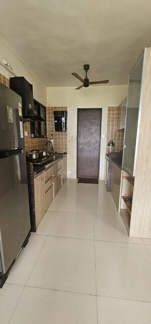 Kitchen in 2 BHK Apartment at Om Tropica, Ravet – for Sale