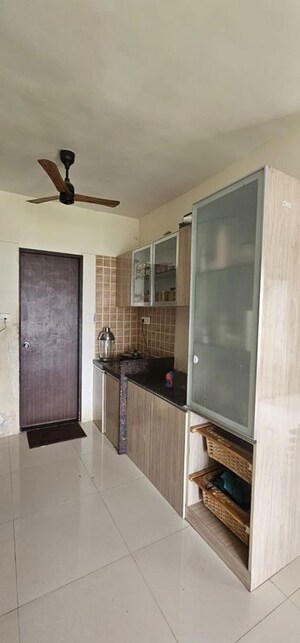 Kitchen in 2 BHK Apartment at Om Tropica, Ravet – for Sale