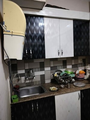 Kitchen in 2 BHK Apartment at Amrapali Dream Valley, Tech Zone 4 Greater Noida – for Rent