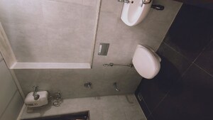 Bathroom in 1 BHK Apartment at Lodha Downtown, Dombivli East – for Rent