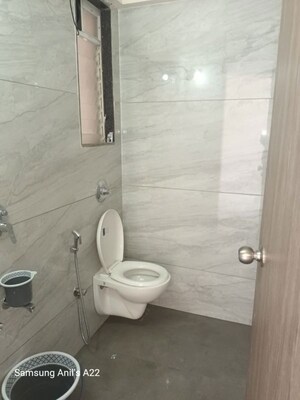 Bathroom in 2 BHK Apartment at Yashraj Park CHS, Kasarvadavali – for Rent