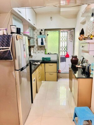 Kitchen in 2 BHK Apartment at Bhakti Pearl, Kasarvadavali – for Sale