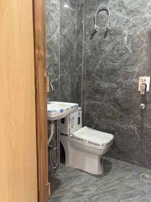 Bathroom in 3 BHK Apartment at Smart World Orchard, Sector 61 – for Rent