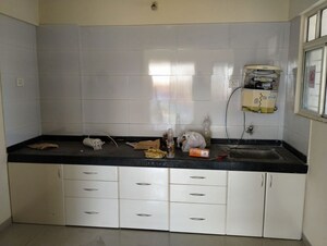 Kitchen in 2 BHK Apartment at Pushpganga  Swapnaganga, Undri – for Rent