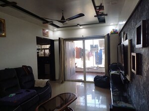 Living Room in 2 BHK Apartment at Sasane Nagar – for Sale
