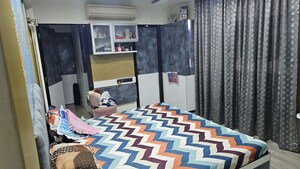 Bedroom in 4 BHK Apartment at Hiranandani Mayflower, Ghodbunder Road – for Sale