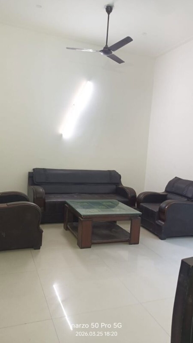 Living Room, paramount-golf-foreste-apartments 4 Bedroom 3008 Sq.Ft. Villa In Zeta I Greater Noida Greater Noida 10197384