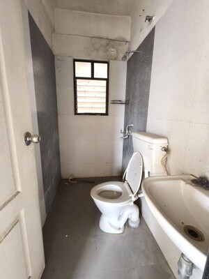Bathroom in 2 BHK Apartment at Mohammadwadi – for Rent