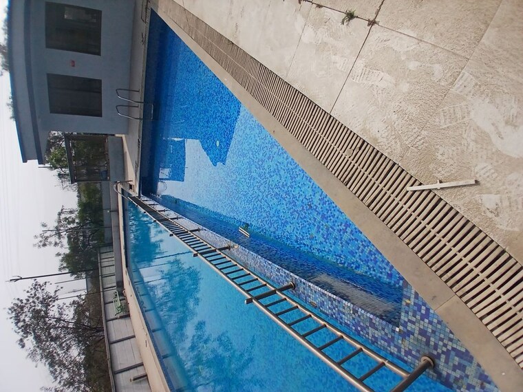 Swimming Pool, global-e-homes 3 Bedroom 1500 Sq.Ft. Apartment In Hinjewadi Pune 10197406