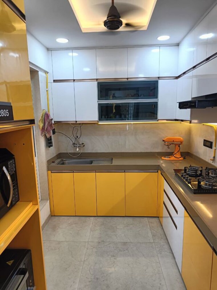 Kitchen, velocity-hill-spring 3 Bedroom 900 Sq.Ft. Apartment In Ghodbunder Road Thane 10197562