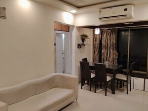 Living Room in 2 BHK Apartment at Manish Lotus CHS, Andheri West – for Rent