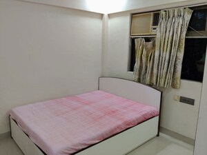 Bedroom in 2 BHK Apartment at Manish Lotus CHS, Andheri West – for Rent