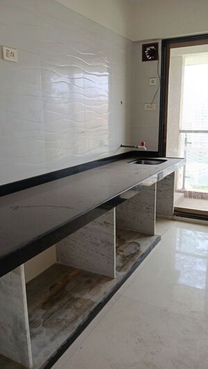 Kitchen in 3 BHK Apartment at Chirag Bhagat Grandeur, Malad West – for Sale