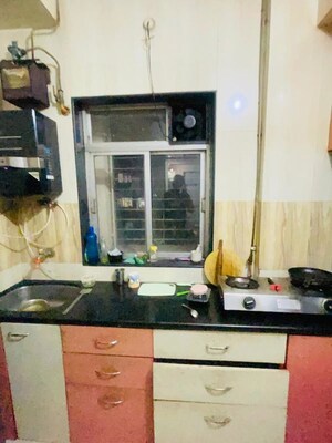Kitchen in 1 BHK Apartment at Pratha Pushpa Society, Ghodbunder Road – for Rent