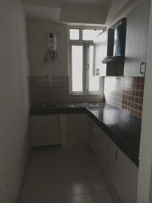 Kitchen in 2 BHK Apartment at Shree Vardhman Mantra, Sector 67 – for Rent