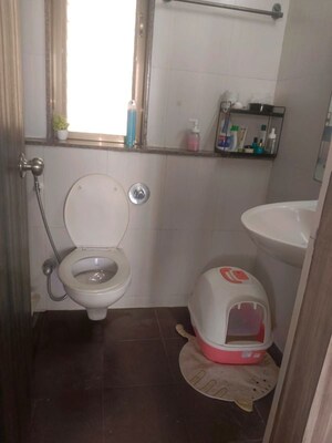 Bathroom in 1 BHK Apartment at Delta Vrindavan, Mira Road – for Rent
