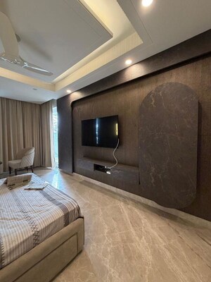 Bedroom in 4 BHK Builder Floor at Ansal Sushant Lok I, Sector 43 – for Rent