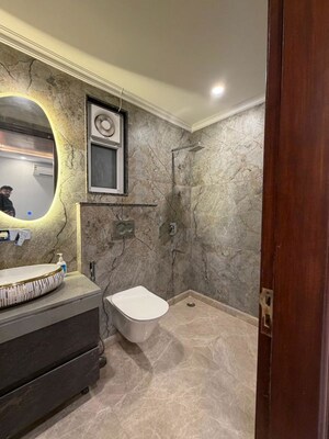 Bathroom in 4 BHK Builder Floor at Ansal Sushant Lok I, Sector 43 – for Rent