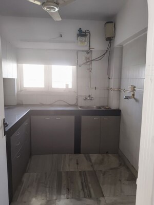 Kitchen in 4 BHK Apartment at Sanjeev Enclave, Andheri West – for Rent