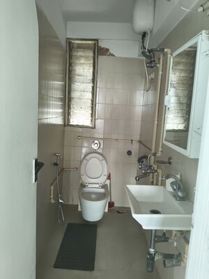 Bathroom in 4 BHK Apartment at Sanjeev Enclave, Andheri West – for Rent