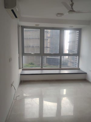 Room in 3.5 BHK Apartment at Omkar Alta Monte, Malad East – for Sale