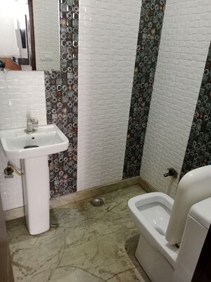 Bathroom in 1.5 BHK Builder Floor at Ansals Sushant City – for Rent