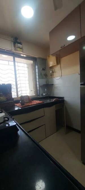 Kitchen in 1 BHK Apartment at Agarwal Trinity Towers, Malad West – for Rent
