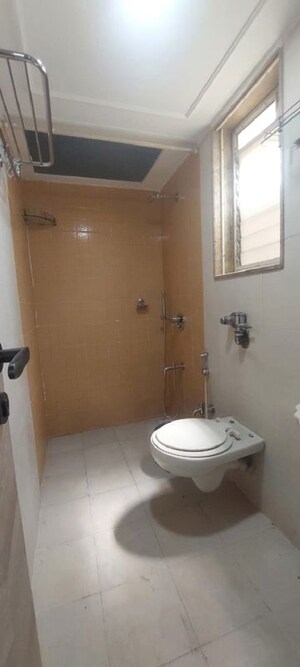 Bathroom in 1 BHK Apartment at Agarwal Trinity Towers, Malad West – for Rent