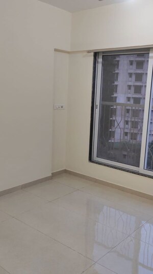 Room in 1 BHK Builder Floor at Nestle CHS, Borivali West – for Sale