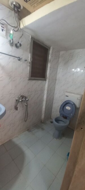 Bathroom in 1 BHK Apartment at Jyoti Complex, Goregaon East – for Rent