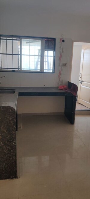 Kitchen in 2 BHK Apartment at Pharande Celestial City, Ravet – for Rent