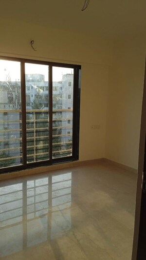 Room in 2 BHK Apartment at Sangam Veda, Andheri West – for Sale