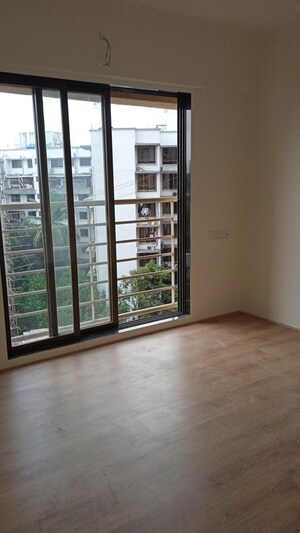 Room in 2 BHK Apartment at Sangam Veda, Andheri West – for Sale