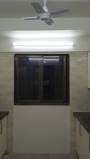 Room in 2 BHK Apartment at Sangam Veda, Andheri West – for Sale