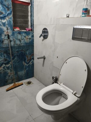 Bathroom in 1 BHK Apartment at Vile Parle West – for Rent