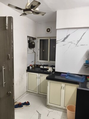 Kitchen in 1 BHK Apartment at Vile Parle West – for Rent
