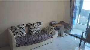 Living Room in 2 BHK Apartment at Dheeraj Jade Residences, Wagholi – for Rent