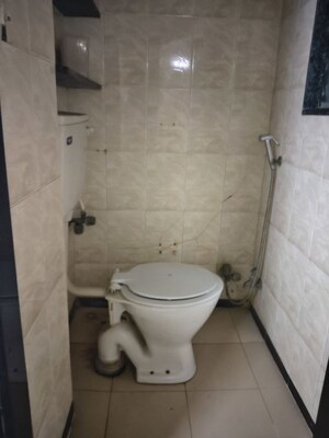 Bathroom in 1 BHK Apartment at Vile Parle West – for Rent