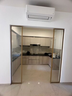 Kitchen in 2.5 BHK Apartment at Smart World Orchard, Sector 61 – for Rent
