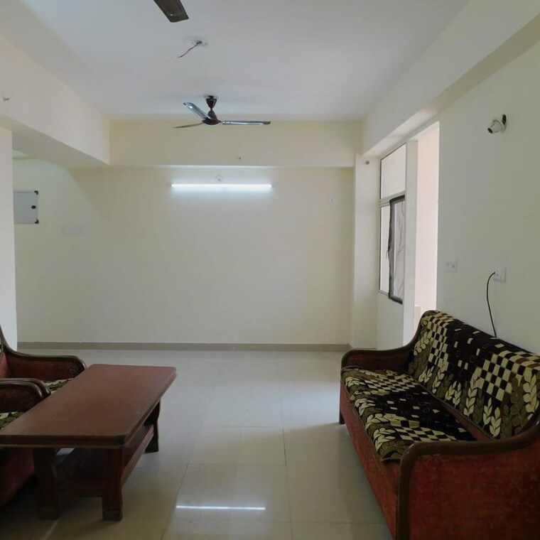 Living Room, charms-castle-phase-ii 2 Bedroom 850 Sq.Ft. Apartment In Sehani Khurd Ghaziabad 10199892