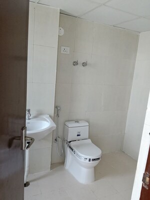 Bathroom in 4 BHK Apartment at Amrapali Heartbeat City, Sector 107 – for Sale