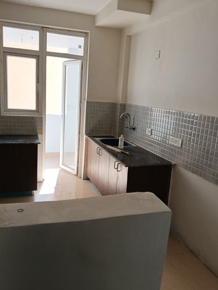 Kitchen, amrapali-heartbeat-city 4 Bedroom 2825 Sq.Ft. Apartment In Sector 107 Noida 10199905