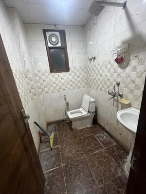 Bathroom in 2 BHK Builder Floor at Chattarpur – for Rent