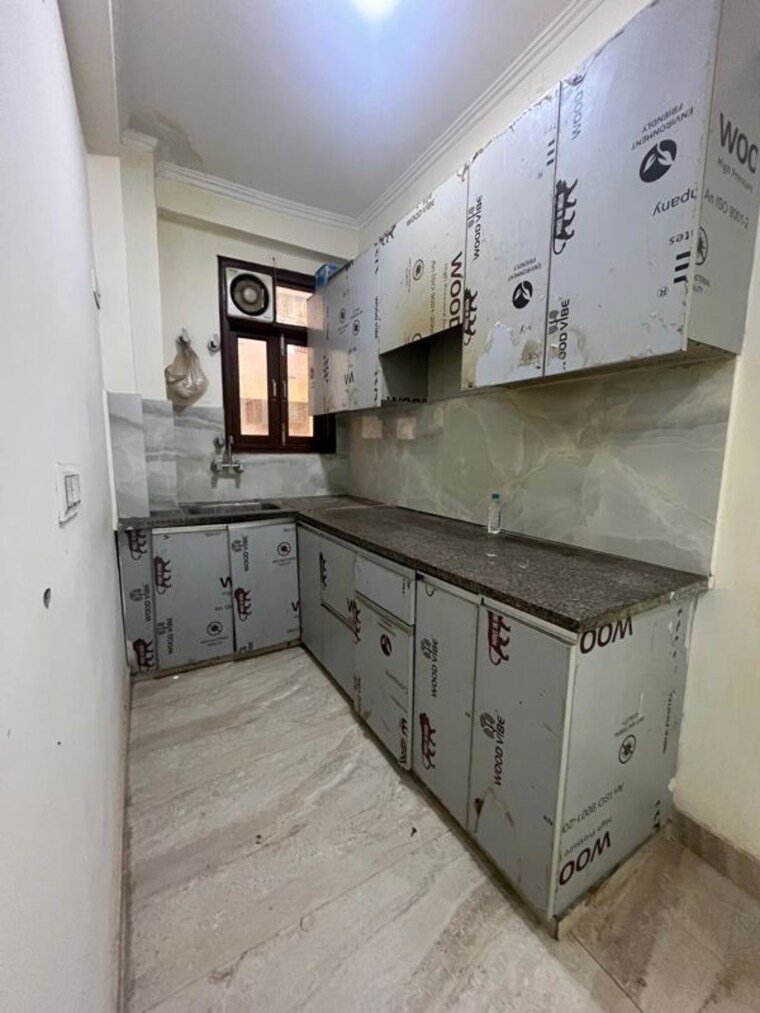 Kitchen, chattarpur 2 Bedroom 85 Sq.Yd. Builder Floor In Chattarpur Delhi 10199938