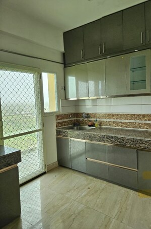 Kitchen in 4 BHK Apartment at Mahaluxmi Migsun Ultimo, Omicron Iii Greater Noida – for Sale