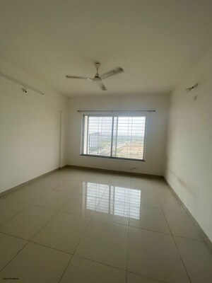 Master Bedroom in 2 BHK Apartment at Dheeraj Jade Residences, Wagholi – for Rent