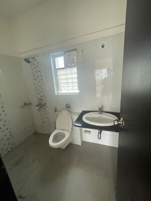 Bathroom in 2 BHK Apartment at Dheeraj Jade Residences, Wagholi – for Rent