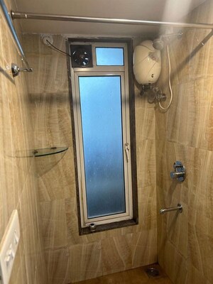 Bathroom in 2 BHK Apartment at Lodha Amara, Kolshet Road – for Rent