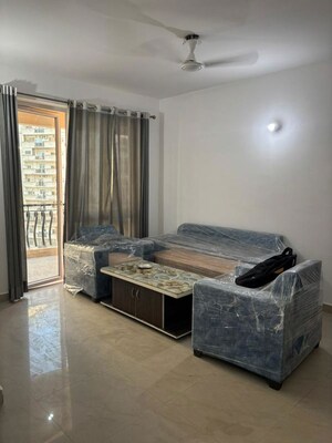Living Room in 2 BHK Apartment at Amrapali Silicon City, Sector 76 – for Rent